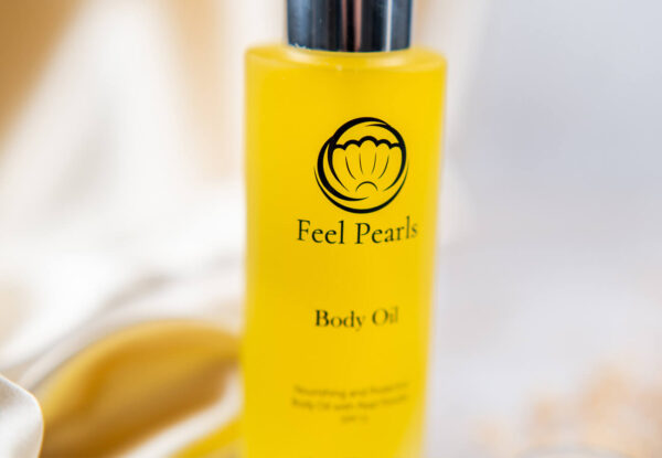 Feel Pearls - Vyživujúci a ochranný telový olej s perlovým práškom SPF 15