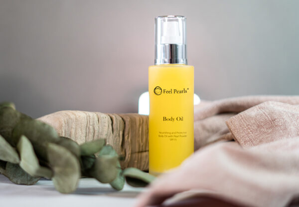 Feel Pearls - Vyživujúci a ochranný telový olej s perlovým práškom SPF 15